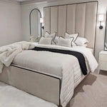 Load image into Gallery viewer, Luxury Mercer Cream Velvet Bed – Panelled Frame with Black Piping - BedsnBoards
