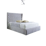 Load image into Gallery viewer, Madrid Wingback Curved Dotted Bed - BedsnBoards

